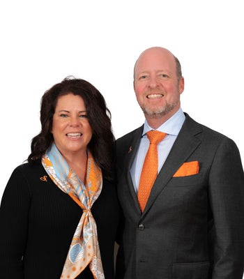 Portrait of Nancy & Doug Wood WOOD TEAM, REALTORS®, Serving Tampa Bay Since 2005.
